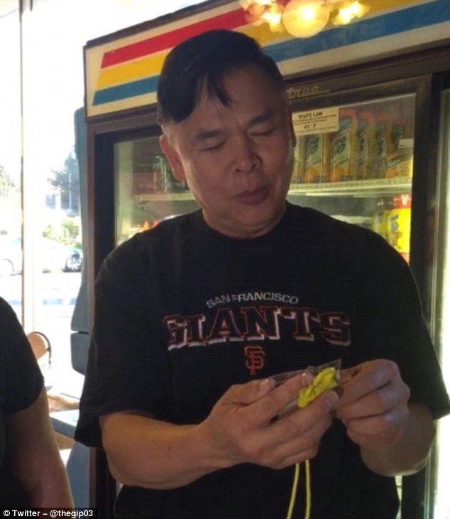 39433C6100000578 3830541 Jim Gip is pictured looking at the message on the necklace his w a 1 1476101284991