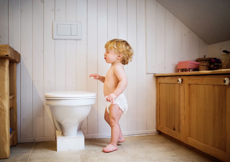 bigstock Cute Toddler In The Bathroom 235450822
