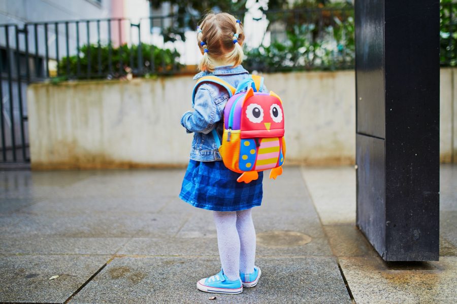 Adorable Toddler Girl With Funny Backpack Ready To Go To Daycare, Kindergarten Or School. First Day