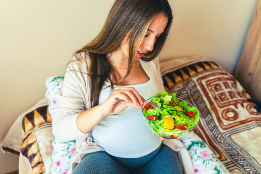 Pregnant Healthy Food Diet. Pregnancy Woman Eating Nutrition Diet Food Salad. Healthy Vegetarian Foo
