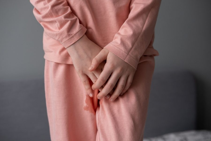 Child Described Pants. Inflammation Of The Urinary System In A Child, Cystitis, Urinary Incontinence
