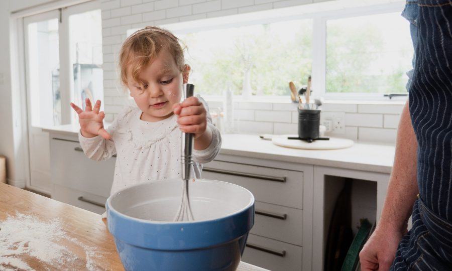 bigstock-Baby-Girl-Whisking-In-A-Mixing-373281292.jpg