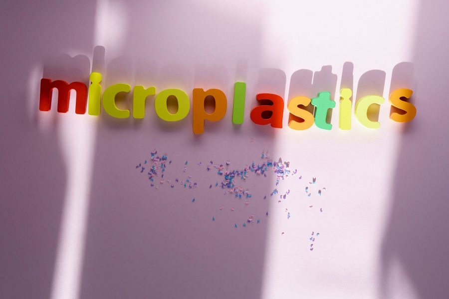 Microplastics, Air Pollution, Aquatic Microplastics. Concept Microplastic In Water And Food.